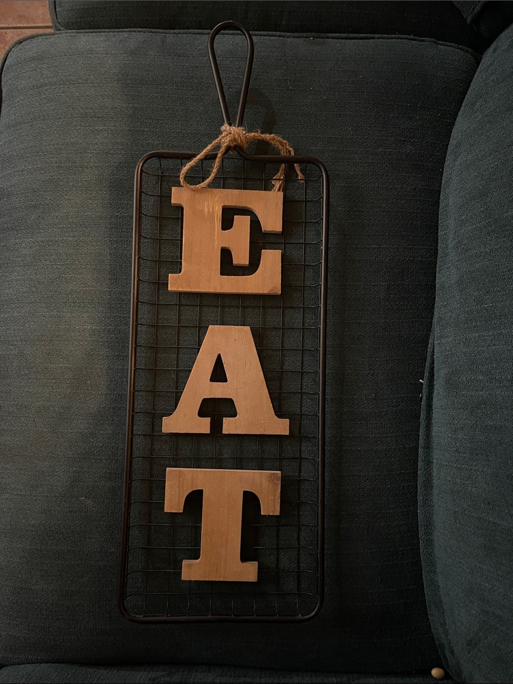 Wooden 'EAT' Wall Hanging on Metal Grid